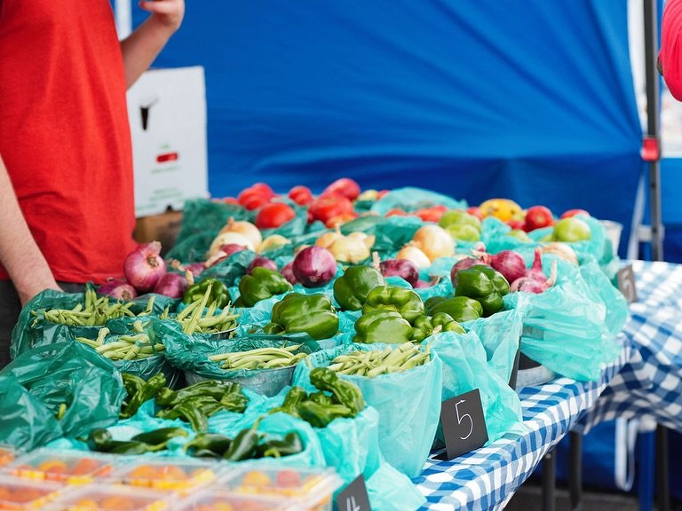 Beautiful bounty: crisp veggies and leafy produce grace the stalls