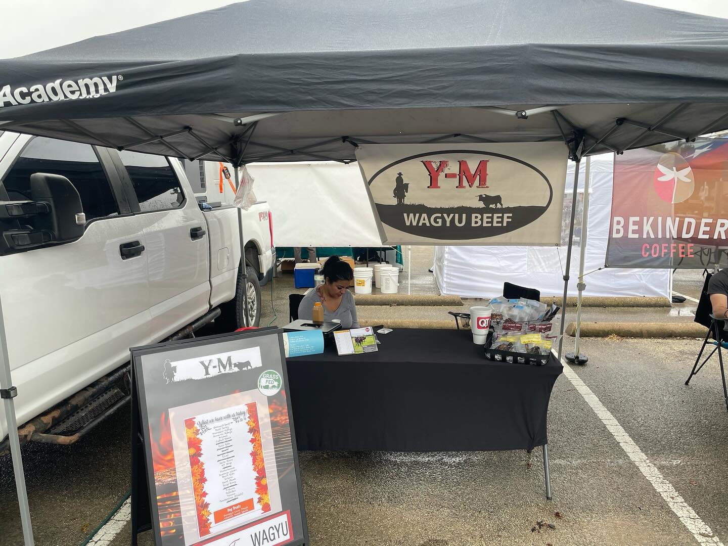Y-M Beef vendor table with Texas Wagyu products at Denton Community Market
